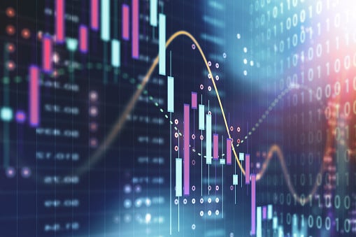 A digital graphic featuring candlestick charts and a golden line graph overlaid on a background of binary code, representing financial data or market trends.